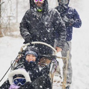 a man that is standing in the snow