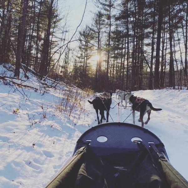 a person that is standing in the snow