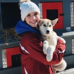 a person holding a dog