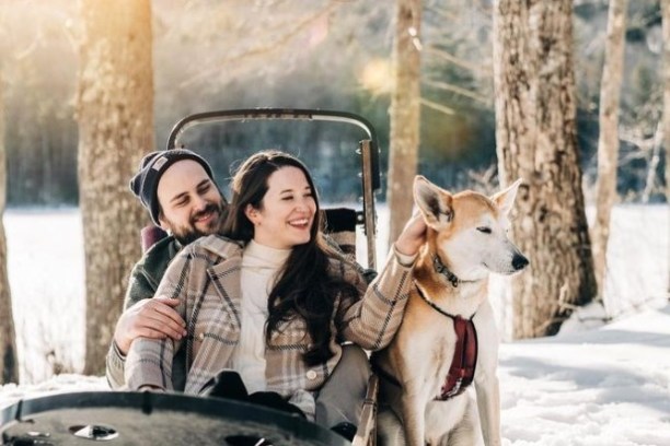 a couple of people that are standing in the snow