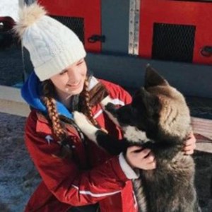 a person holding a cat