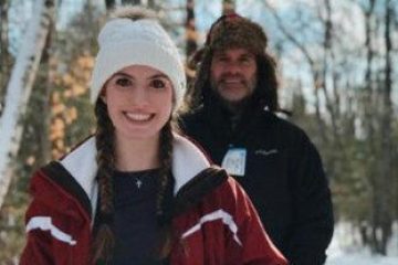 a group of people posing for the camera