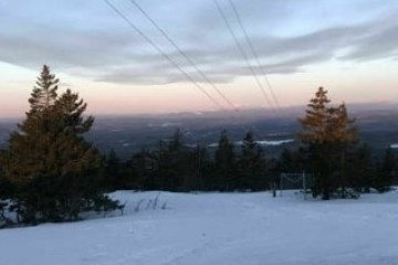 a snow covered slope