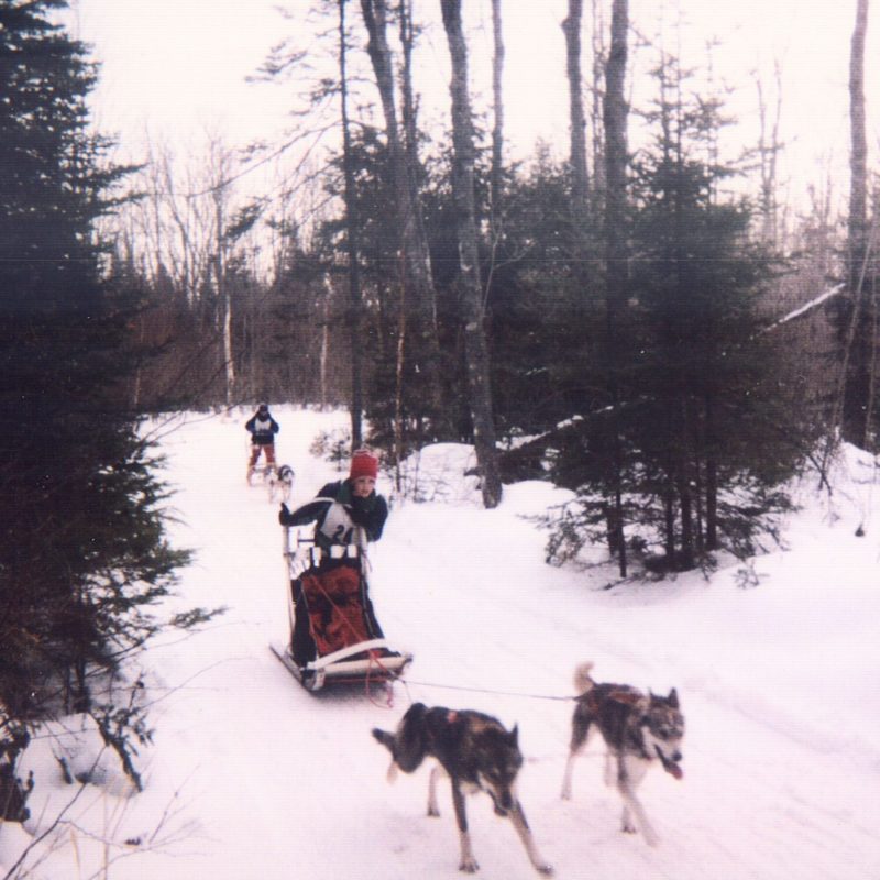 a man riding a horse in the snow