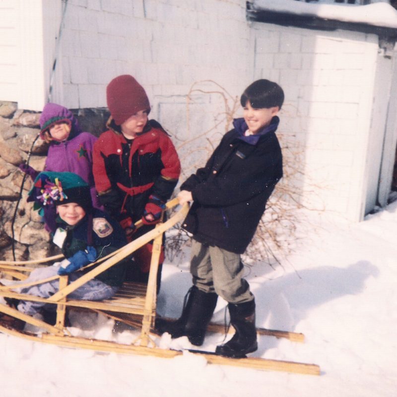 a man that is standing in the snow