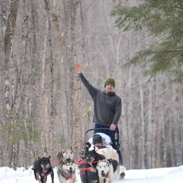 a man riding a horse in the snow