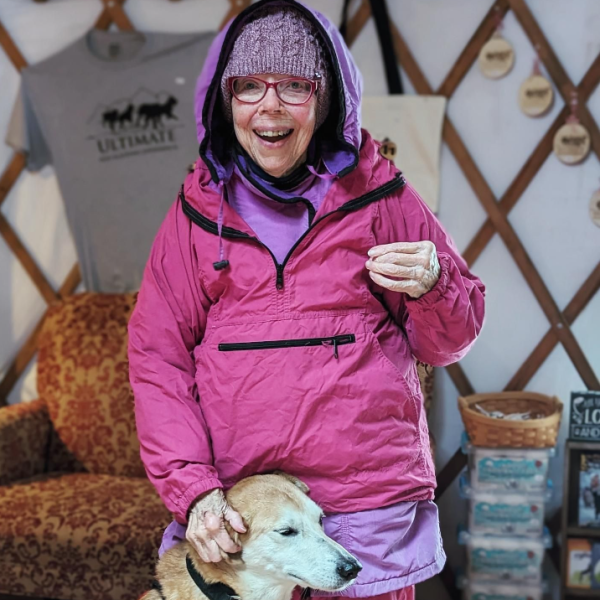 a person holding a dog